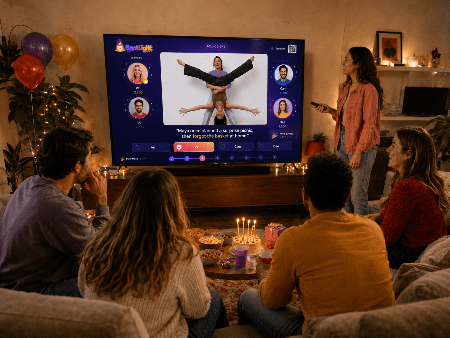 A birthday game hosted on a large TV screen